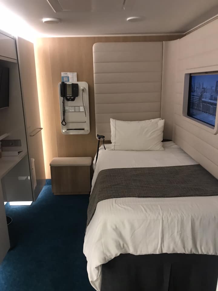 solo cabin with a single bed on a cruise