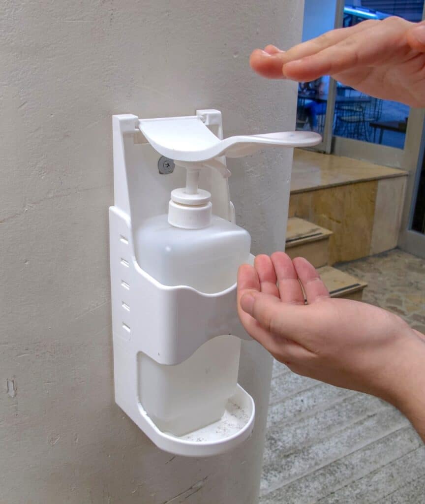 Hand sanitizer dispenser