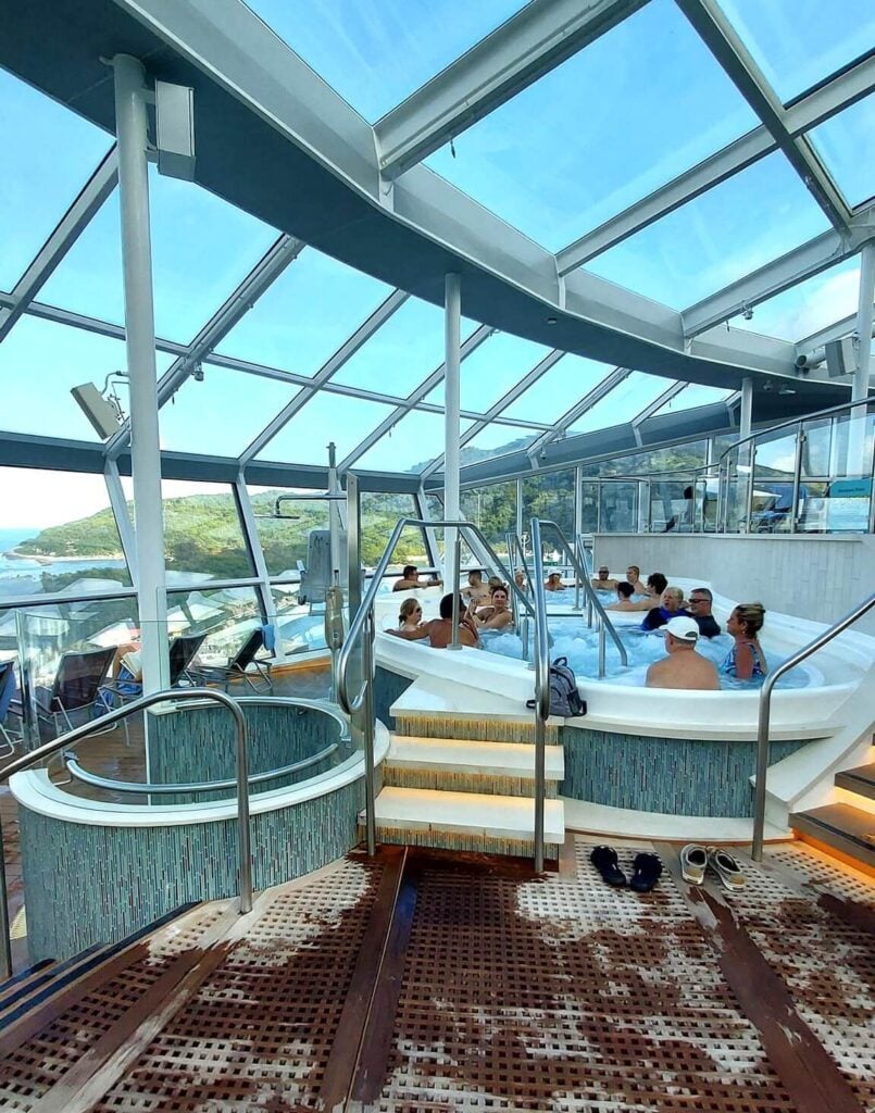 Adults-only hot tub inside the Solarium on Odyssey of the Seas